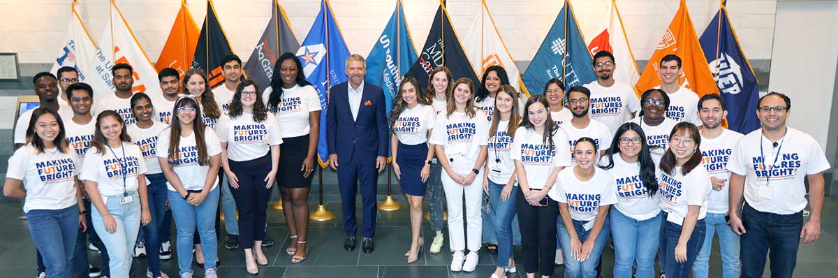 Group photo of the 2022 summer interns with Chancellor JB Milliken at the center of the group