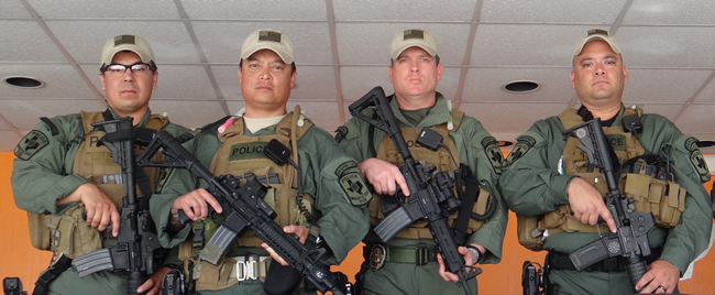 Sergeant Barrera was an original member of the System Rapid Response Team and is shown here (far right) with other members from the UT San Antonio Police