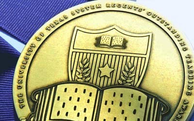 Close up of the ROTA medal and blue ribbon