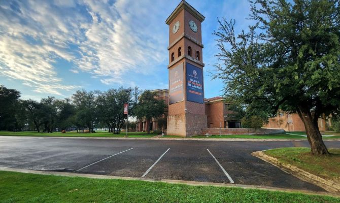 Laredo tower during an afternoon, in front of a blue sky and clouds